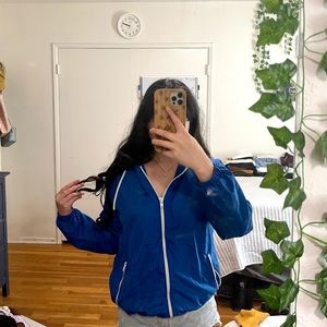 Blue windbreaker zip up jacket